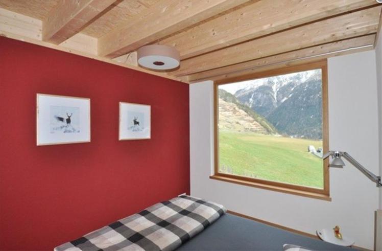 Apartamento Chasa Paoletta Ramosch Habitación foto