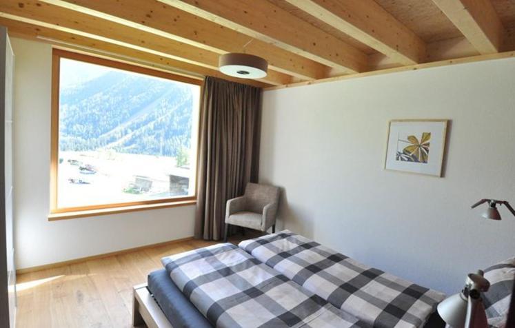 Apartamento Chasa Paoletta Ramosch Habitación foto